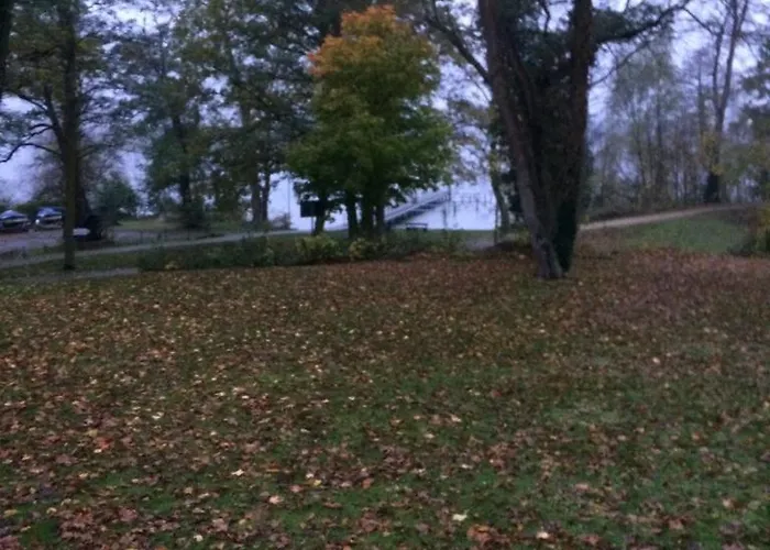 Garaze Деревянный коттедж Miedzychod